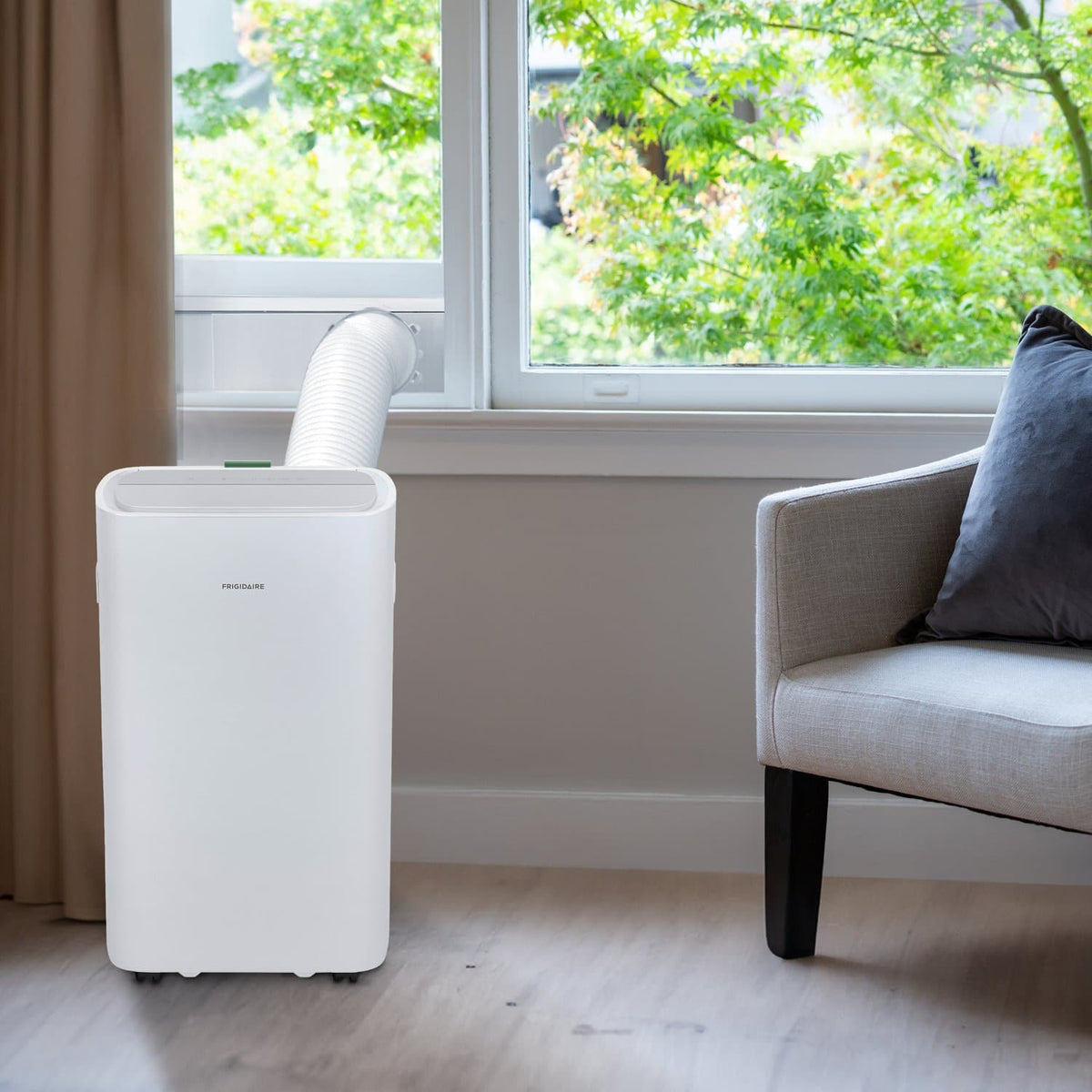 Frigidaire - 115V 14,000 BTU 450 Sq. Ft. Portable Air Conditioner with 12,000 BTU Supplemental Heat Function - White