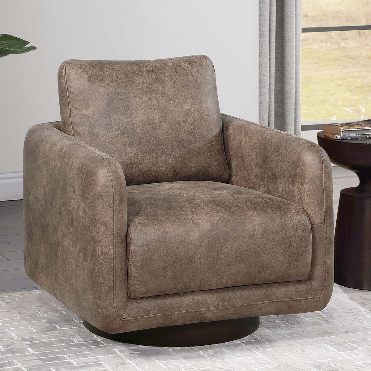 Sillón decorativo giratorio tapizado