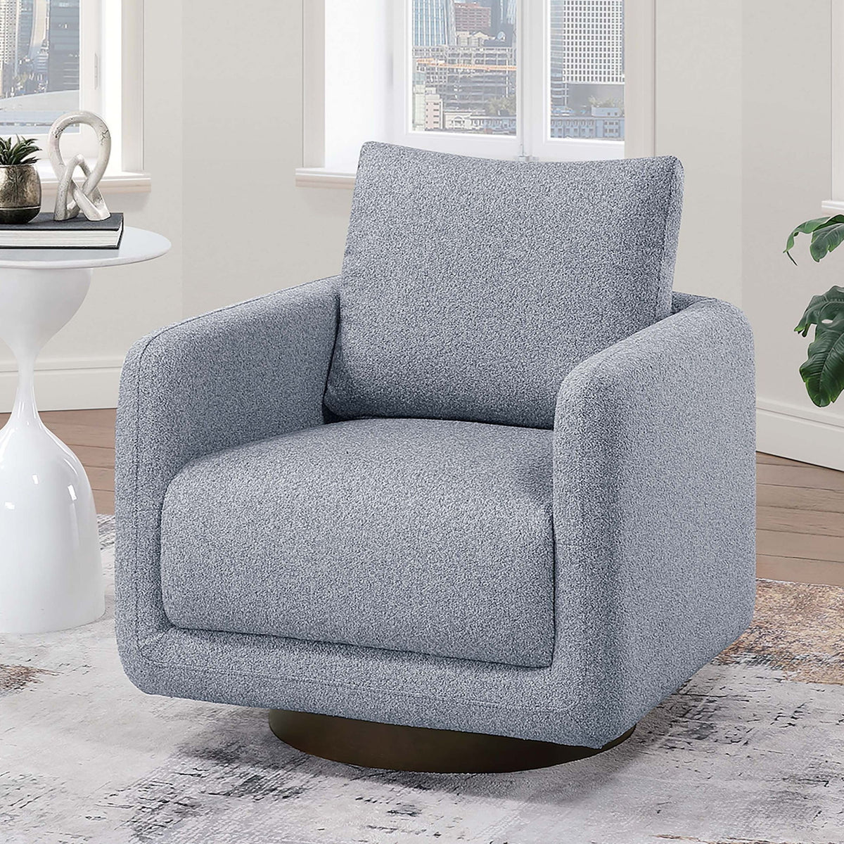 Sillón decorativo giratorio tapizado