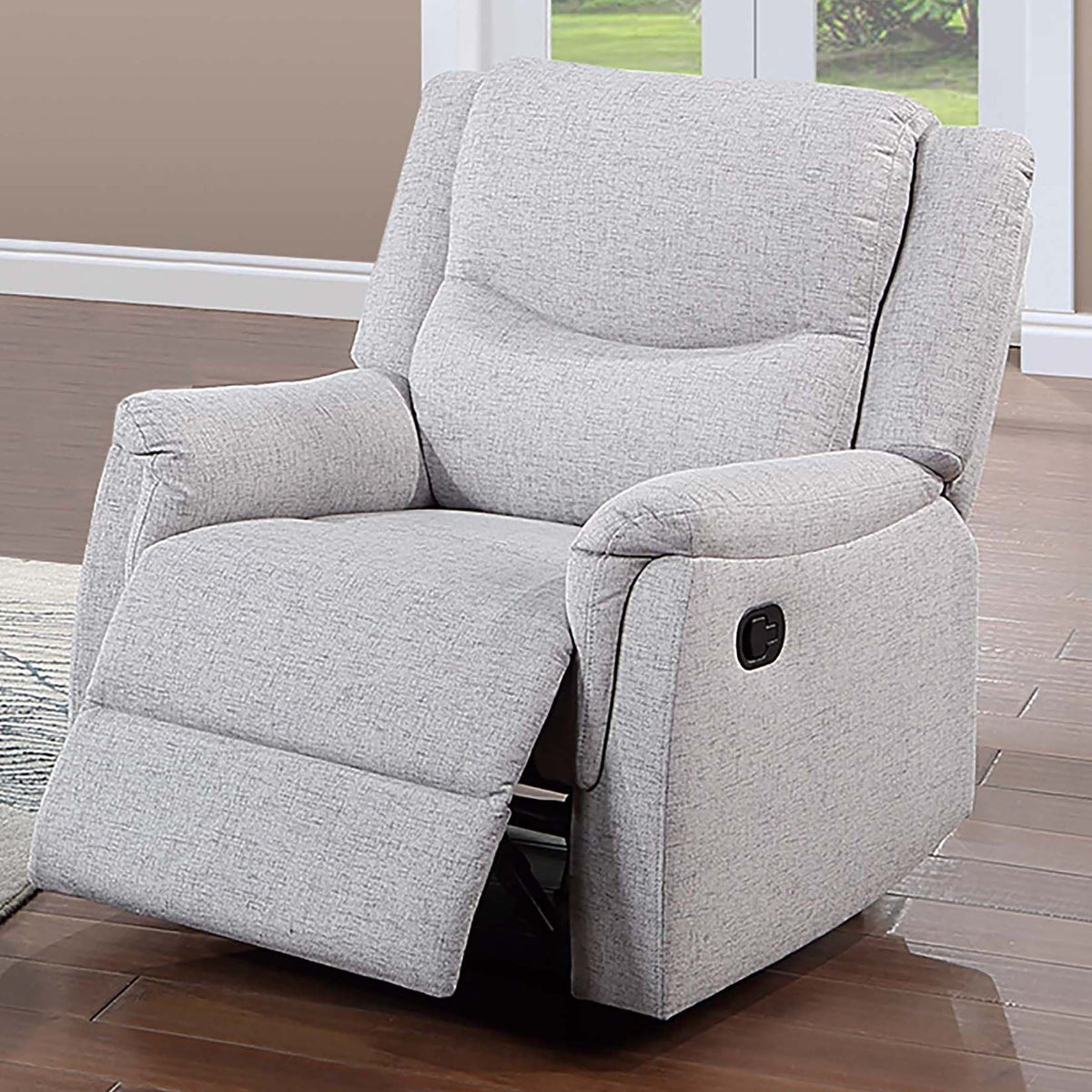Sillón reclinable manual con asiento y respaldo tapizados y reposacabezas de apoyo