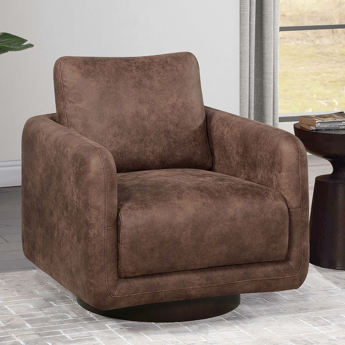 Sillón decorativo giratorio tapizado