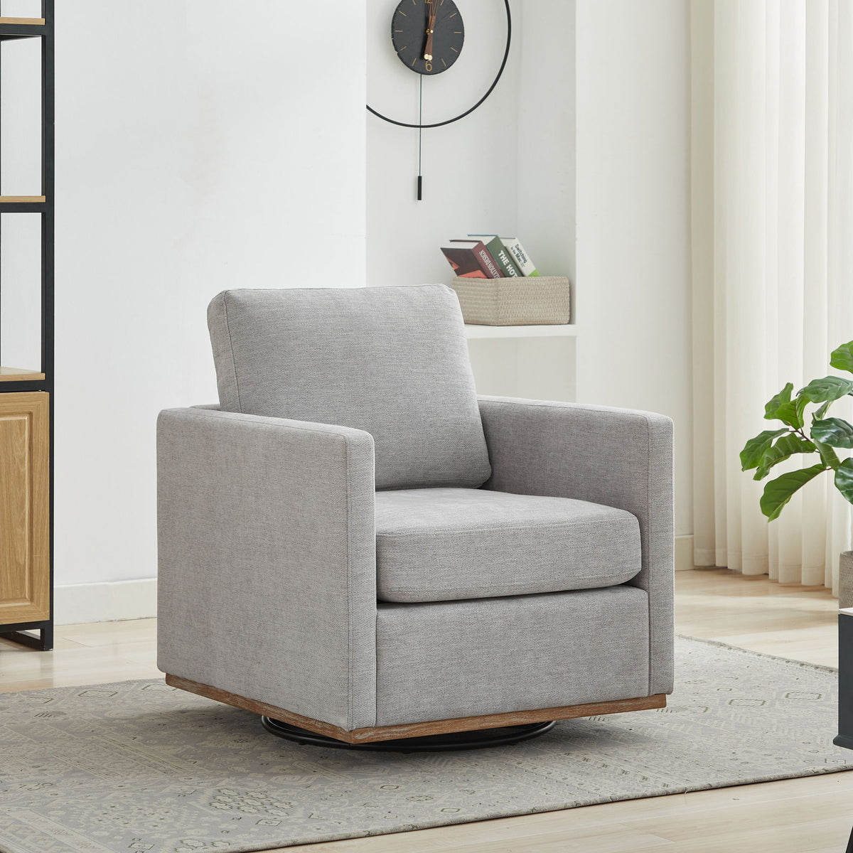 Sillón decorativo giratorio tapizado de forma cuadrada