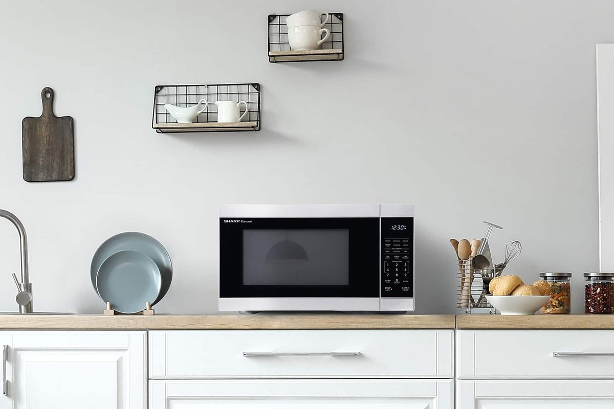 Sharp - 1.1 cu ft Countertop Microwave With Sensor Cooking - Stainless Steel