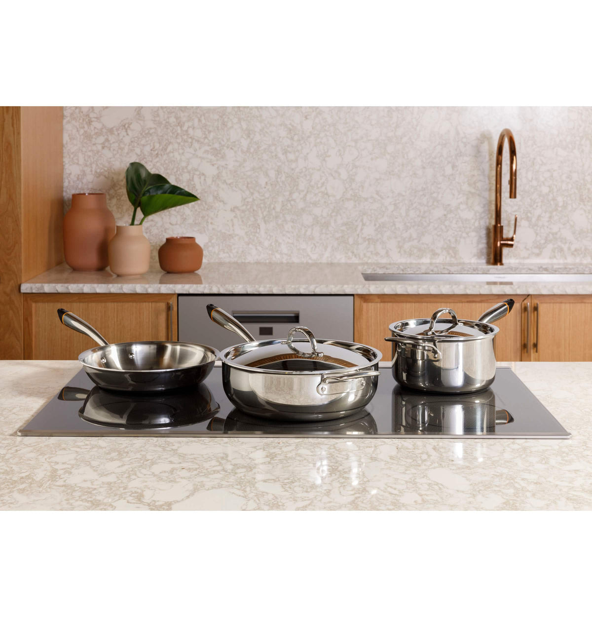 Café - ENERGY STAR 36" Built-In Touch Control Electric Induction Cooktop - Black