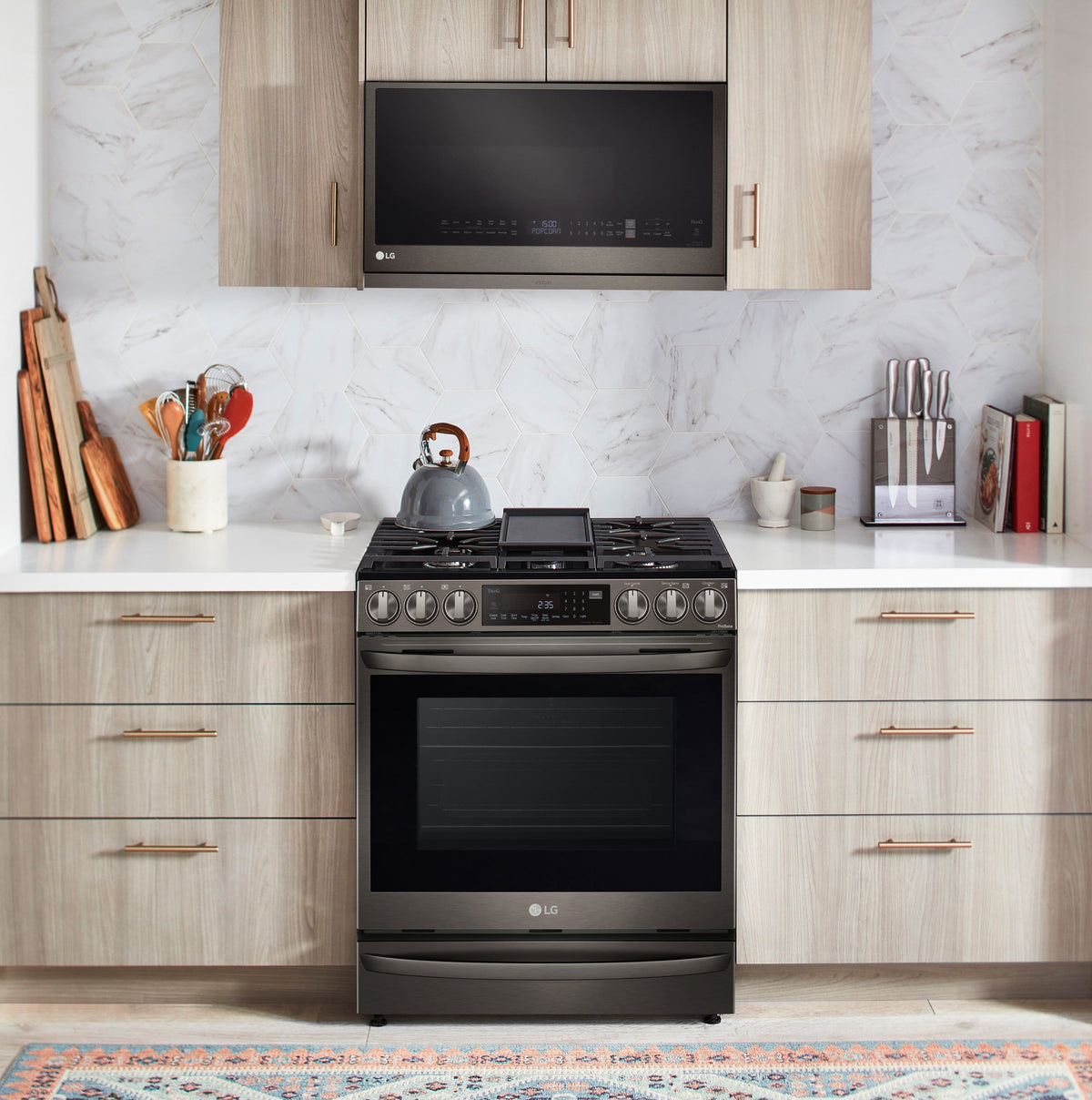LG - 2.1 Cu. Ft. Over-the-Range Smart Microwave with Sensor Cooking and ExtendaVent 2.0 - Black Stainless Steel