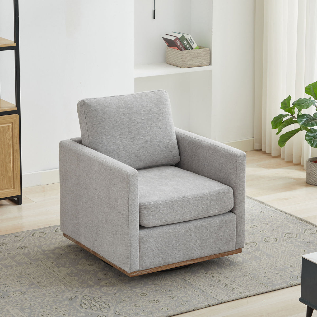 Sillón decorativo giratorio tapizado de forma cuadrada