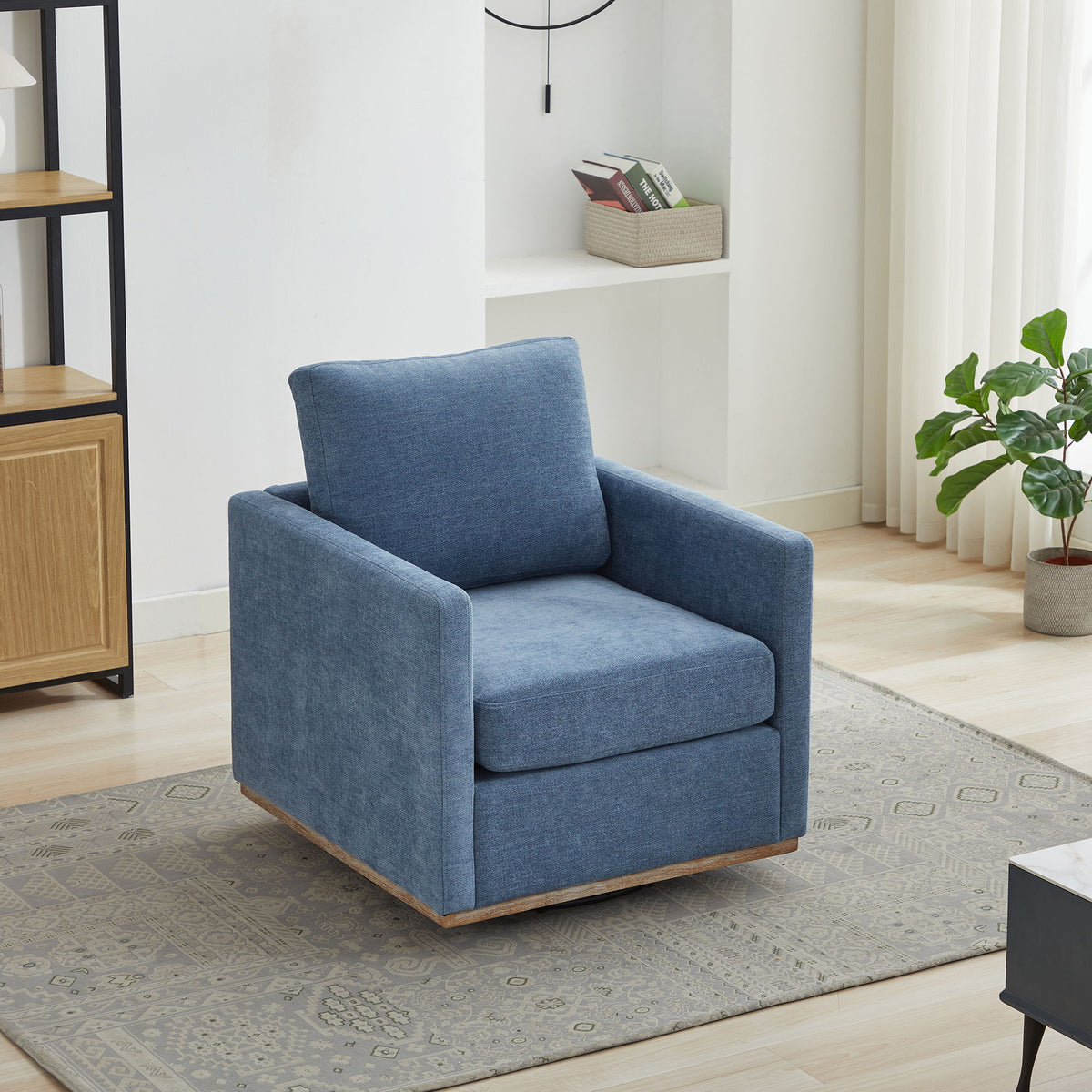 Sillón decorativo giratorio tapizado de forma cuadrada